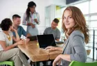 Professional team collaborating in a modern office empowered by Elevate Technology managed IT and business solutions.