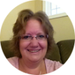 Elevate Technology testimonial graphic featuring a headshot of a smiling woman with glasses, identified as Jody Tuinier, Office Manager.