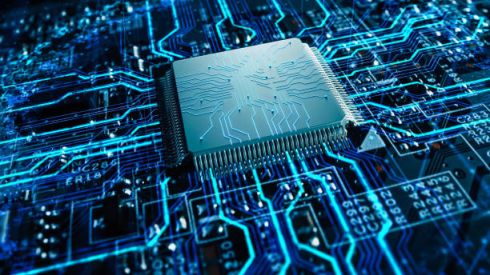 High-angle processor chip with blue circuits and Elevate Technology for mobile performance, featuring cloud-based phone system, Cloud PBX Phone System, Voicemail-to-email, and Hosted PBX capabilities.