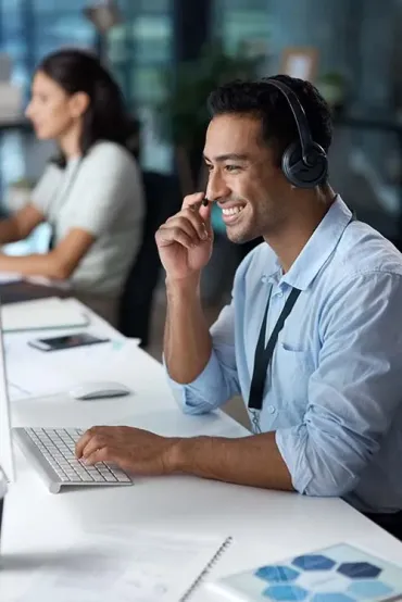 IT support professional representing Elevate Technology’s managed IT services and cybersecurity support for Fort Worth businesses.