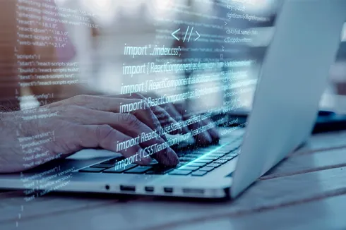 Hands typing on a laptop with code overlay, highlighting programming, cloud hosting, business email, and cloud email by Elevation Technology.