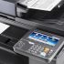 A close-up of a Kyocera TASKalfa printer's control panel and document feeder.