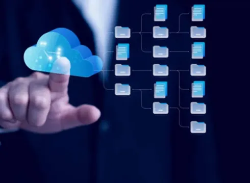 A person's hand interacting with cloud-based files and folders.